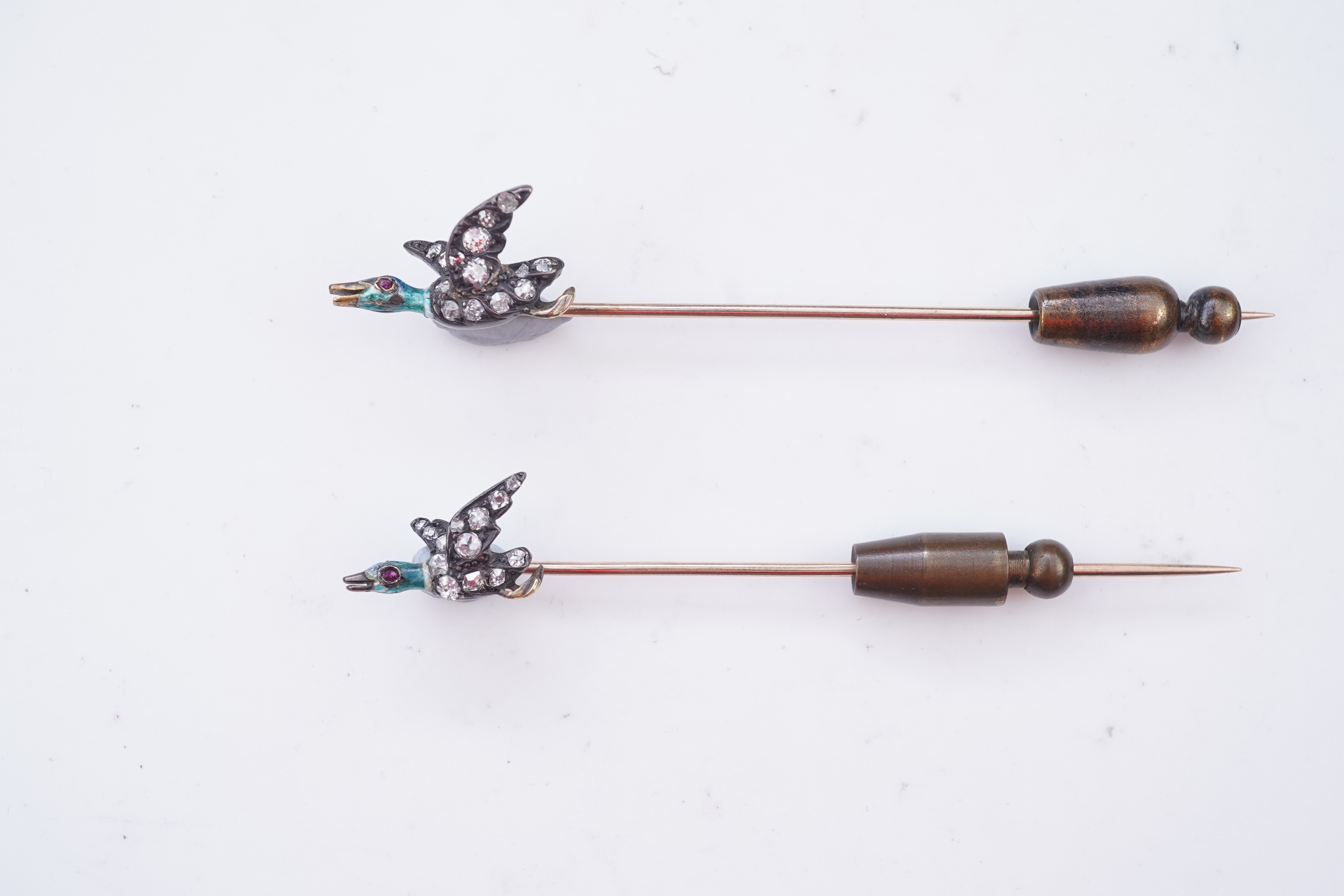 A pair of novelty enamel and diamond stick pins, circa 1900